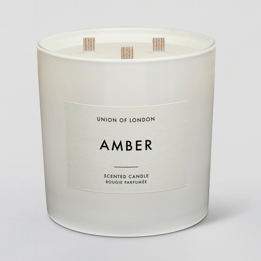 The Amber triple wick candle has a beautifully blended scent of musk with notes of honey.&nbsp; Amber is such a wonderful warming scent - slightly smokey, yet also powdery and woody.&nbsp; A perfect candle for Autumn.&nbsp; &nbsp;All of Union of London's candles are hand poured in the UK from soy wax and they only use quality fragrances and essential oils so they give a lovely clean burn.&nbsp; The unique wide cotton wick creates a large warm light giving any room an added elegance.