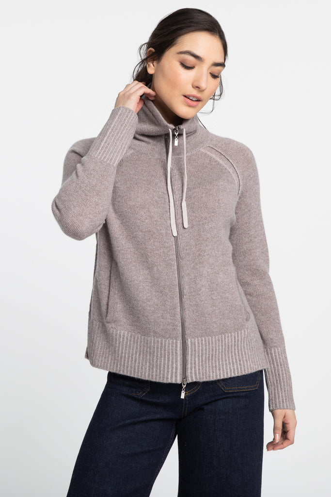 Gorgeous 100% cashmere super soft zip up cardigan.  The epitome of quiet luxury!  Featuring a funnel neck and drawstring tie this is perfect for travelling paired with the matching Kinross Cashmere wide legged bottoms.  This luxurious knit definitely deserves a spot in your cashmere collection!