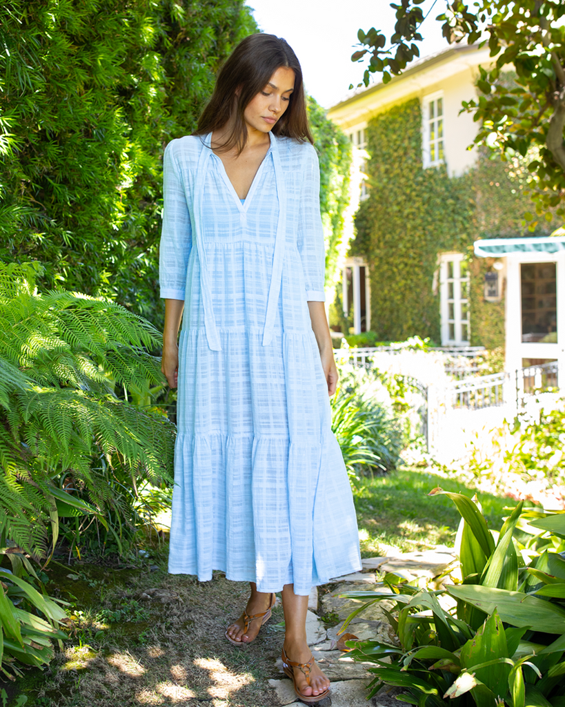 How beautiful is this dress? The perfect coverup. Sheer, window pane textured cotton in a light breezy blue colour way. The maxi length and mid length sleeves ensure this dress is the perfect versatile holiday piece, just add one of our beach bags and flip-flops and you're ready! 