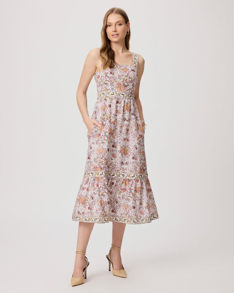 The Fiori Dress from Paige is a must for your warm weather dress collection!&nbsp; Crafted from a super soft linen/cotton blend and featuring a square neckline, wide adjustable straps and a full skirt this pretty dress is just at home at brunch as it is on date night!&nbsp;
