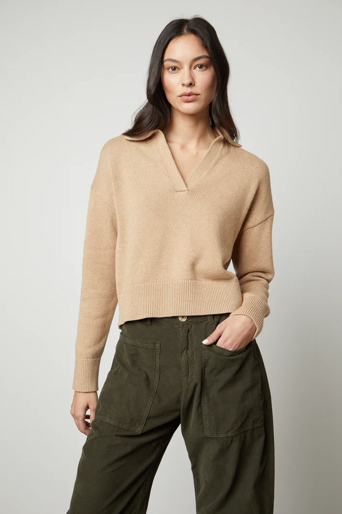 The Lucie Jumper is a super soft cotton cashmere knit from Velvet by Graham & Spencer. In an easy neutral tone, this pullover features a preppy/sporty collar and long sleeves. This is perfect paired with your favourite skirt or denim!
