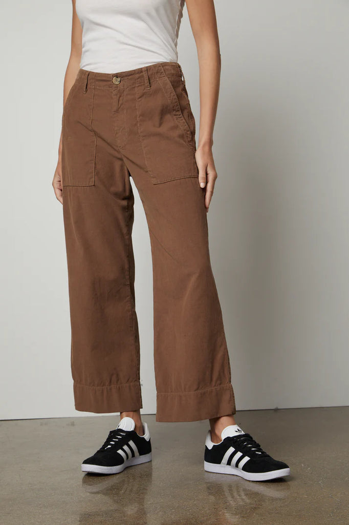 The Vera Corduroy Trousers from Velvet by Graham & Spencer have a cropped wide leg and feature utility details, such as the patch pockets at the front and back. With a high-rise, these trousers create a flattering silhouette and look great paired with a chunky knit and boots.