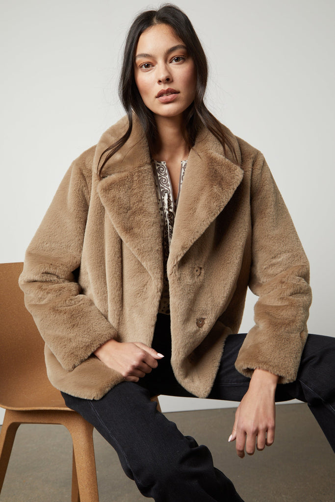 Yes please we would love this jacket!  In the softest faux fur imaginable and in a great neutral this short jacket will elevate any outfit!  Perfect over a maxi dress or denim and it's so soft you'll want to throw it on for your dog walks or trip to the gym as well!  Literally will want to live in it!