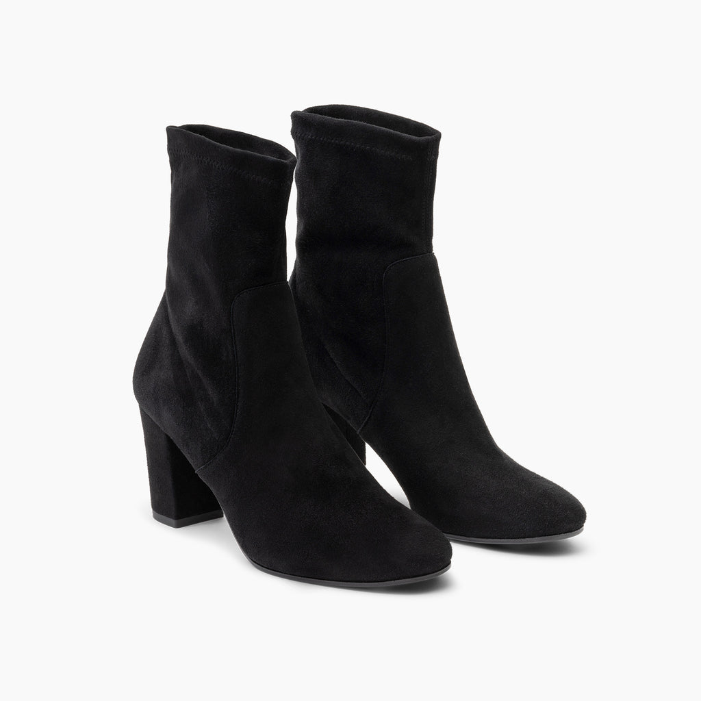 The Suza Ankle Boots from Parallele are made from a stretch suede in an always classic black, they also have a leather sole with an anti-slip pad. The elegant suede covered block heel measures 7cm - making these boots super comfortable for everyday wear.