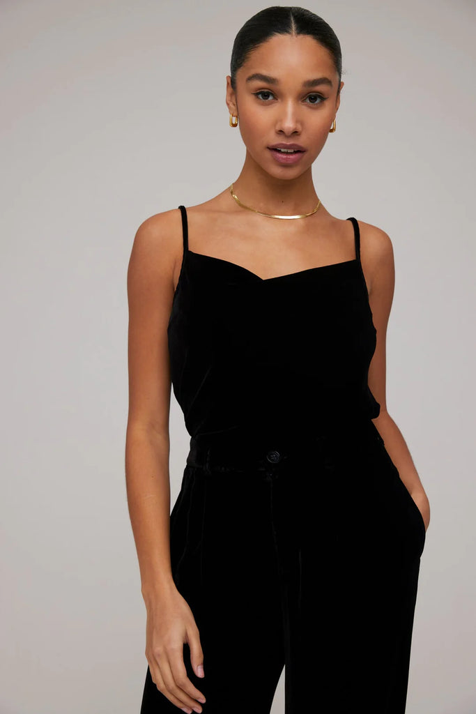 This Cowl Neck Cami from Bella Dahl is made from a soft velvet fabric and features adjustable spaghetti straps and a cowl neckline. Style this top with jeans, a blazer and strappy heels for an easy evening look. 