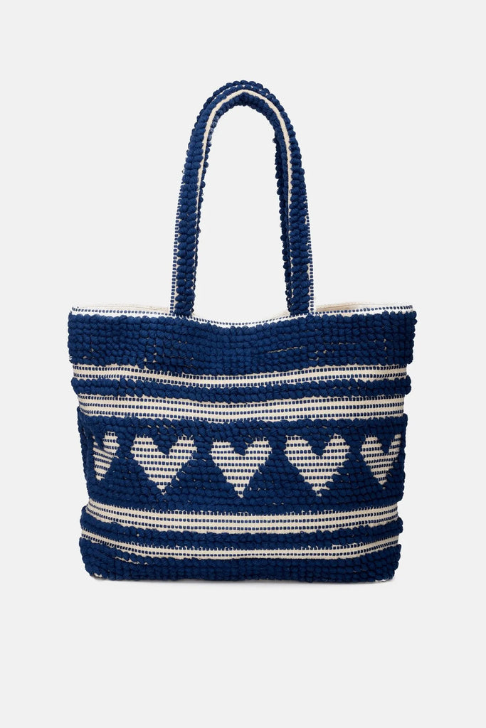 This spacious Towel Tote Bag from Fabienne Chapot has one large compartment with push button closure and two side pockets. The bag has a long handle and can be worn on the shoulder or in the hand. In Caribbean blue, it makes a perfect beach bag! 
