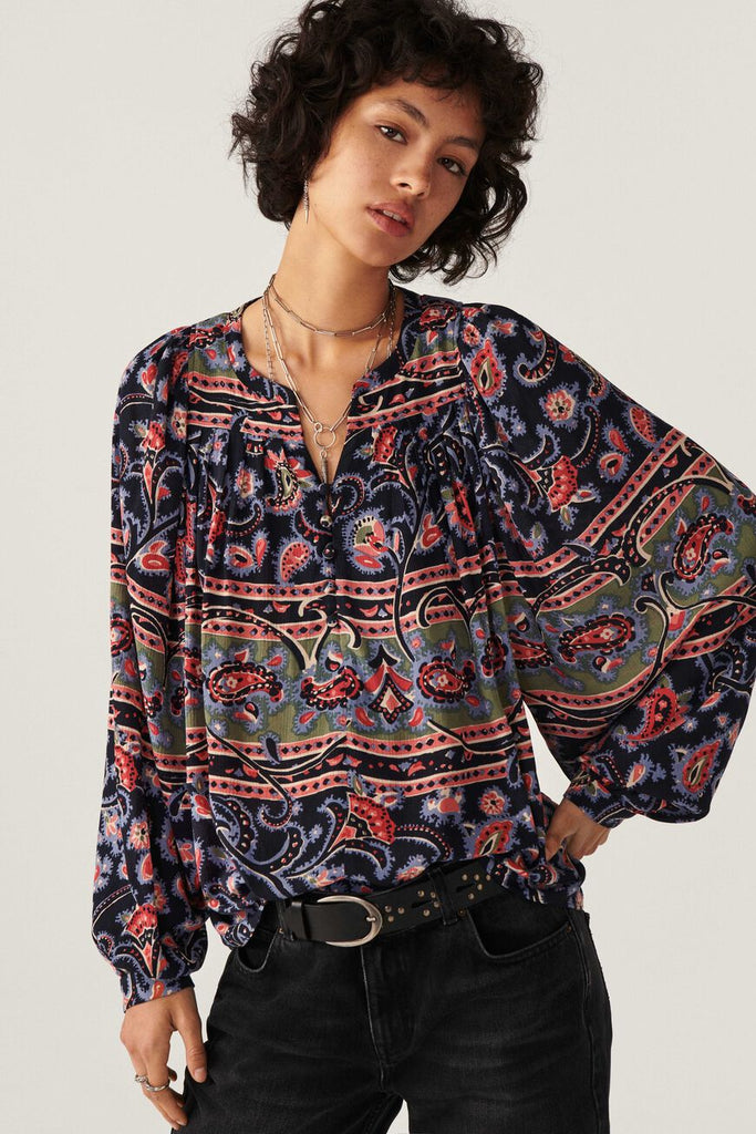 Channel your inner boho chick with the pretty Naoul Blouse by uber cool french brand ba&sh!  Crafted from super soft flowing fabric in a bright print and featuring a round neck that dips into a short button placket and lovely loose puffy sleeves.  Looks fab paired with your favourite denim or try with the matching skirt for a cute co-ord!