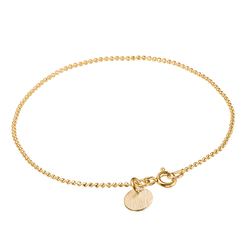 The Ball Chain Bracelet style is gorgeous because of it's simplicity.  This is the original Ball Chain Bracelet and instead of an enamel features a pretty gold disc.  This looks great paired with the other colourful Ball Chain Bracelets.