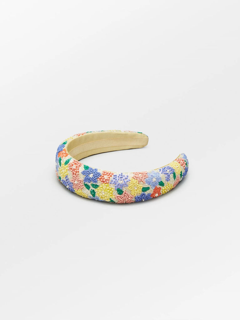 This gorgeous floral beaded hairbrace is not only attractive but highly practical at keeping your flocks at bay.  Great as a gift or as a treat for yourself.    