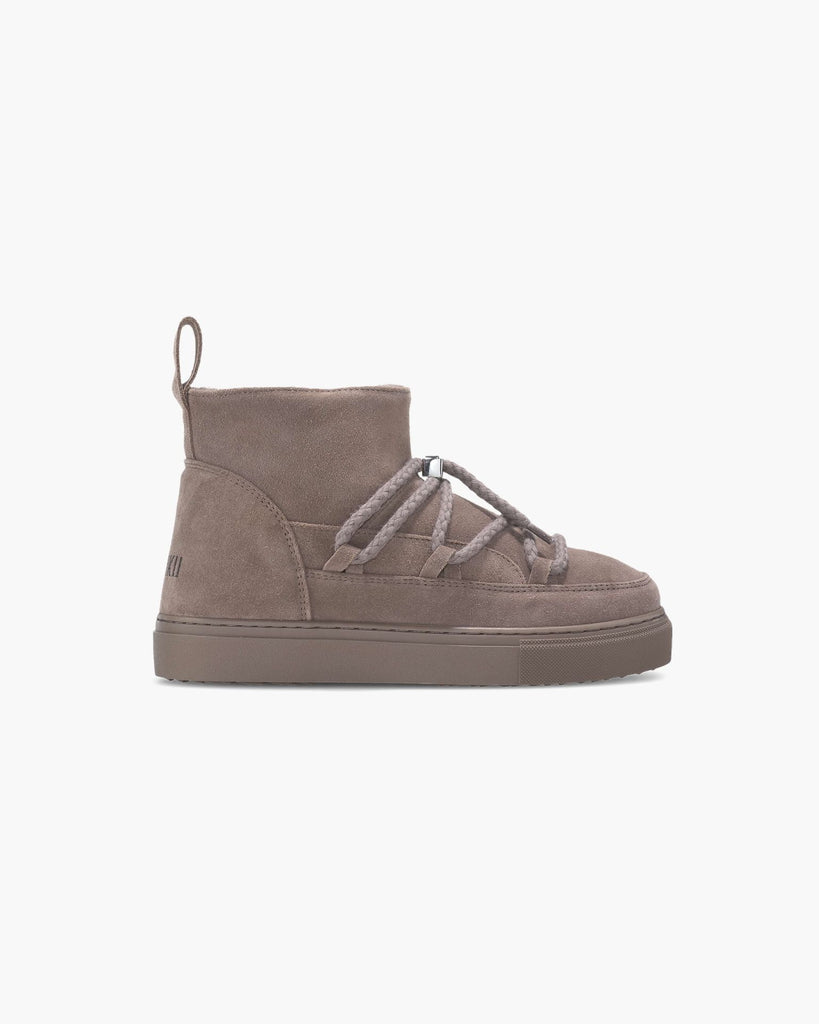 We are very excited to be stocking these amazing snowshoes by uber cool brand Inuikki.&nbsp; Inuikki translates to "beauty of the cold" and these sneaker style shoes will make you want to do just that!&nbsp; Fully line with shearling to keep your toes toasty and a functional toggle tie for the laces, they will not only up your style but are practical and comfortable too.&nbsp;&nbsp;