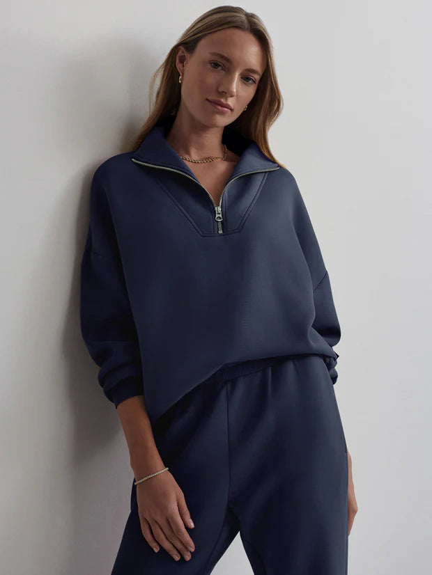 The Hawley Half Zip is back this season in "Blue Nights", a stunning deep blue colour with silver toned hardware. Made in their signature DoubleSoft™️ fabric, you will melt into it! Pair with the matching Slim Cuff Pant or for an off duty look a pair of Paige jeans.
