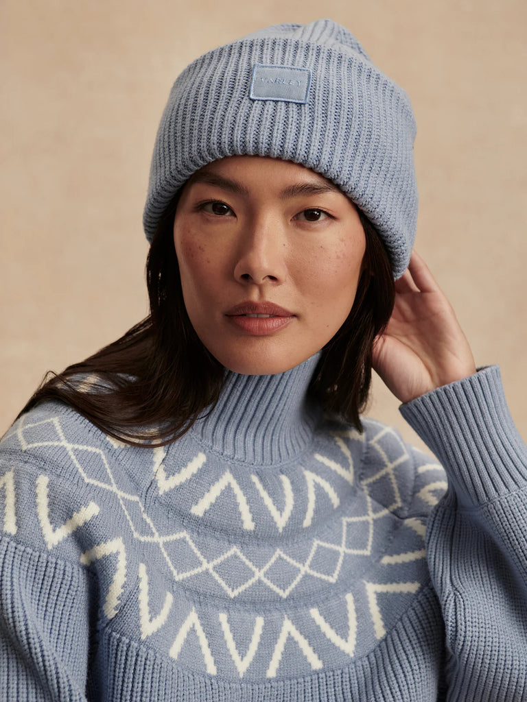 The Carly Beanie from Varley is crafted from Soft Viscose fabric and features all-over ribbing with fleck detailing. With its deep turn-back, this soft beanie is designed to elevate your winter wardrobe and keep you warm.

