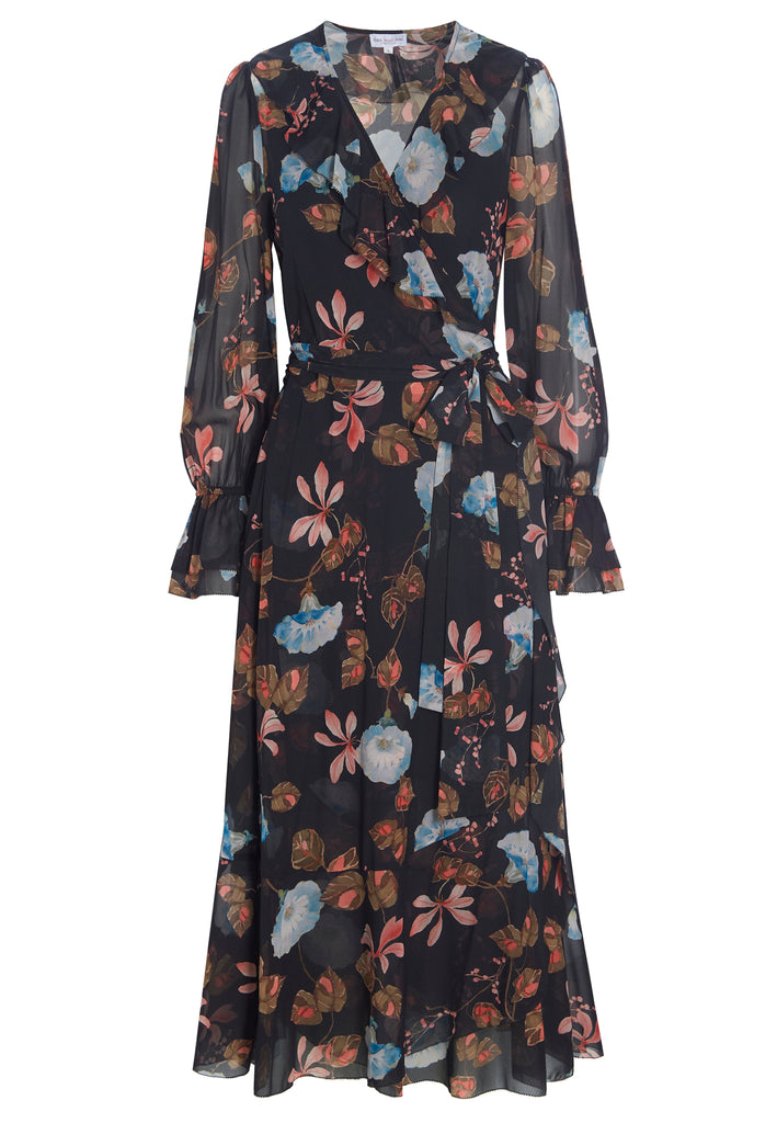 This stunning Josefina Wrap Dress from Dea Kudibal features a delicate ruffle cascading down the front to add an extra touch of femininity as well as long sleeves with extra frill details. The flowing silk fabric features a pretty dark floral - it is bound to turn heads! 