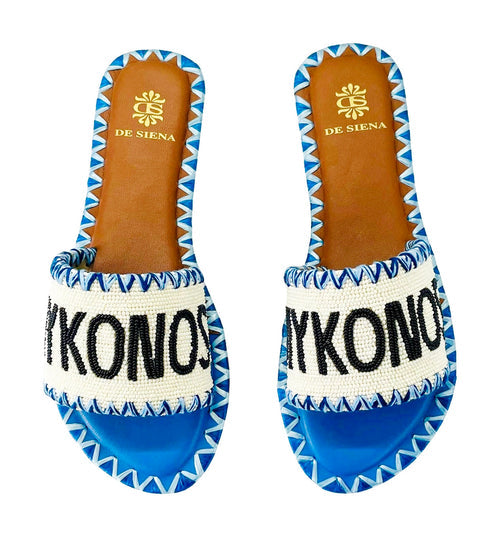 We are delighted to be stocking cool girl resort brand De Siena. These gorgeous sliders are a perfect blue colour which bring back memories of the sea in Mykonos! Handcrafted and featuring a round toe, a beaded strap and leather sole with small heel these are perfect if you are jetting away to warmer climes. 