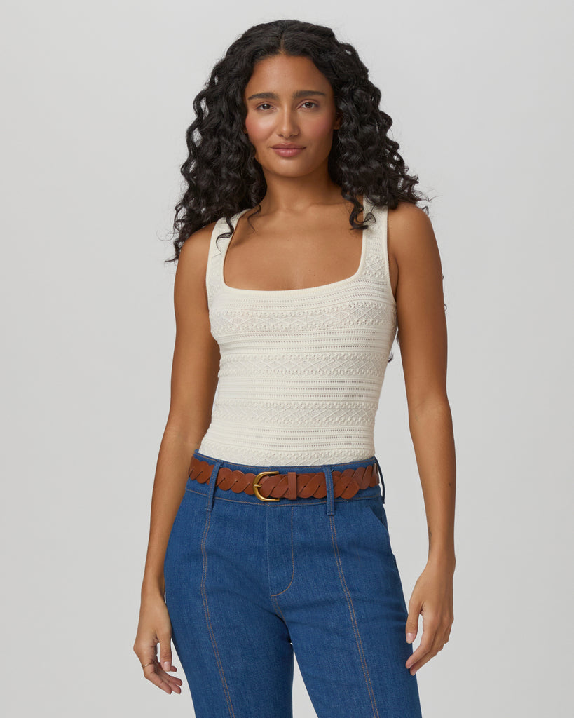 Say hello to Iman!&nbsp; In always wearable ivory this is a vest you will reach for again and again.&nbsp; Featuring a flattering straight neck line, thick shoulder straps and a neat fit this is perfect paired with any of your wide legged denim!