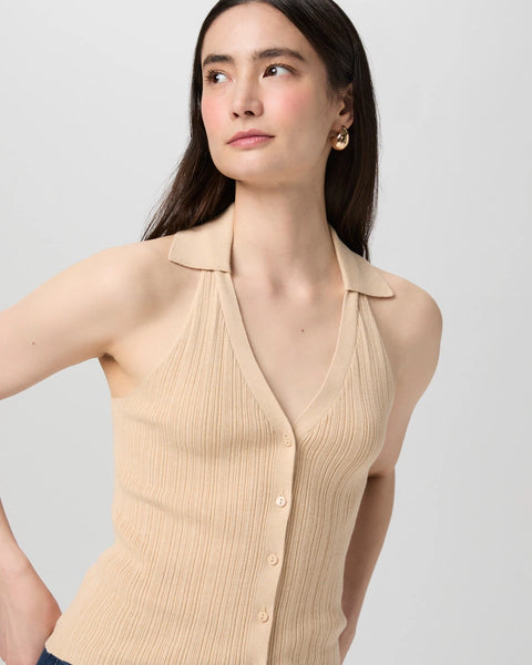 Crafted from a luxurious Eco Peachskin fabrication the Noella Tank in always wearable taupe is a fabulous basic for your wardrobe.&nbsp; Featuring a polo collar, a flattering deep v with a pleated effect and buttons down the front this is perfect paired with your favourite wide legged denim.