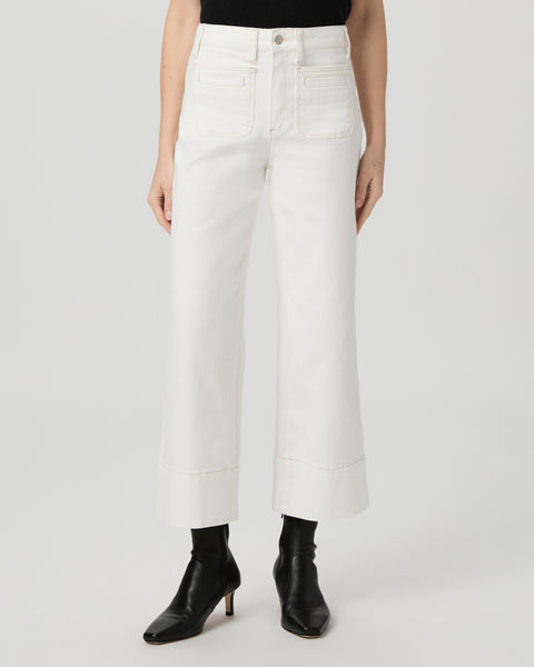 This modern high waisted wide leg jean from Paige has an easy relaxed fit and the elongated silhouette gives an effortlessly chic look.&nbsp; New for Spring in a gorgeous ecru featuring welt patch pockets and of course they have the comfortable stretchy denim with plenty of recovery that we love!