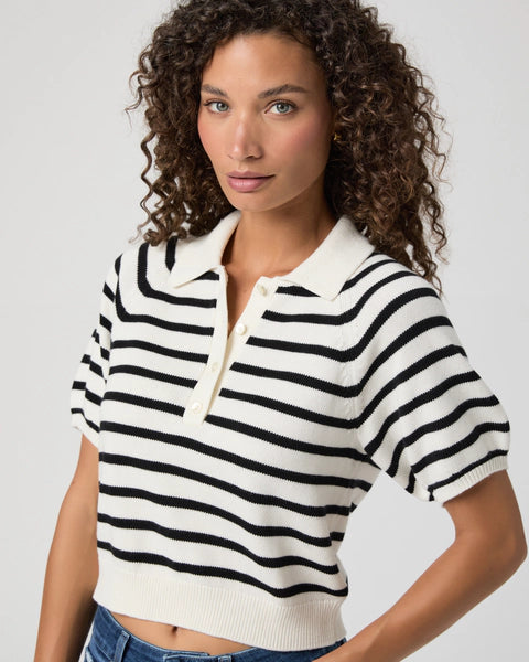 The Birch Top from Paige is crafted from a super soft Eco Peachskin fabric and features feminine puff sleeves, a henley button detail down the front and has a cropped, boxy fit.&nbsp; Perfect to pair with all your wide leg denim this is an easy top for the weekend that you will reach for again and again.