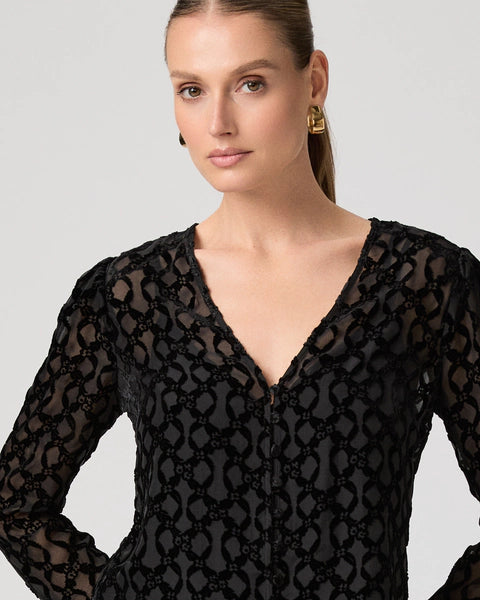 The Amaya Top from Paige is crafted from a silk viscose blend and features a flattering v neckline, delicate covered buttons, slightly puffed shoulders and a slim long sleeve.&nbsp; In timeless black this is perfect paired with your favourite black denim or pair with a skirt for a totally different look!&nbsp; &nbsp;One you will reach for again and again.&nbsp;&nbsp;