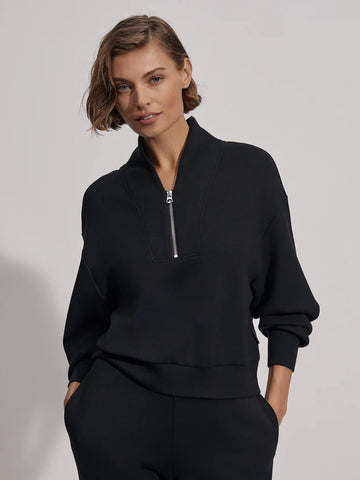 Varley have done it again with this super soft relaxed half zip. Made in their signature DoubleSoft™️ fabric, you wont want to take it off!  It is a slightly cropped style and features drop sleeves and deep cuffs. Pair with the matching Slim Cuff Pant or Alder High-Rise Short for a relaxed, everyday look. 