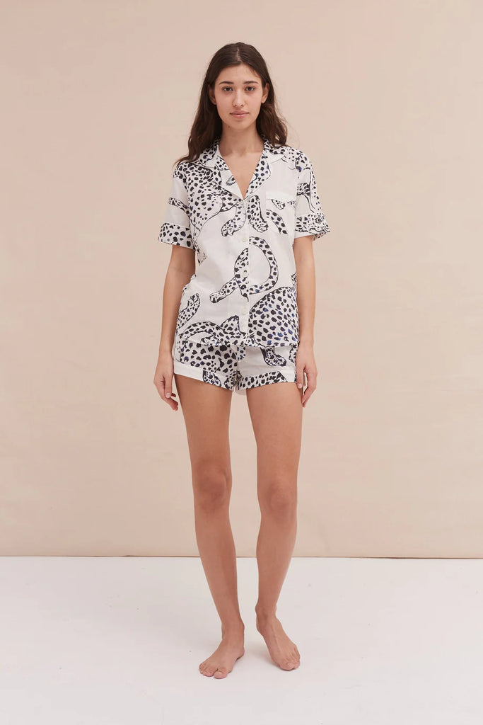 We are excited to be stocking super cool British pyjama brand Desmond & Dempsey. The Short Sleeve Pyjama Set consists of a tailored short sleeve shirt with a rounded collar and piping and matching tie-waisted pocketed shorts. It's crafted from extremely soft 100% Cotton Voile and comes in this gorgeous Jaguar print. 