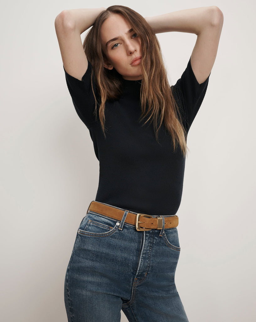 A wardrobe necessity!&nbsp; The Alastair Merino wool knit from Veronica Beard is crafted from super soft pure Merino Wool and features a mock turtleneck, just short of elbow length sleeves and soft ribbing.&nbsp; Perfect under jackets this is an excellent layering piece.&nbsp; It won't make you too hot and will always make you look polished.&nbsp; Also available in a neutral.