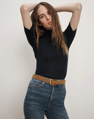 A wardrobe necessity!&nbsp; The Alastair Merino wool knit from Veronica Beard is crafted from super soft pure Merino Wool and features a mock turtleneck, just short of elbow length sleeves and soft ribbing.&nbsp; Perfect under jackets this is an excellent layering piece.&nbsp; It won't make you too hot and will always make you look polished.&nbsp; Also available in a neutral.