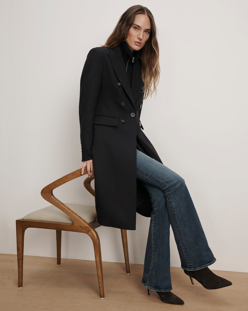 What a coat!&nbsp; The Stryder Double Breasted Dicky Coat in navy is truly a classic sleek piece you will have forever.&nbsp; Crafted from a premium Italian double weave suit fabric and featuring a fitted waist, cutaway hem and subtle A line silhouette which flatters this is one of those coats that smartens up whatever you are wearing.&nbsp; Also the removable extra long dickey with funnel neck and front zip adds a touch of sportiness.&nbsp; A wardrobe classic you will reach for all Winter long.