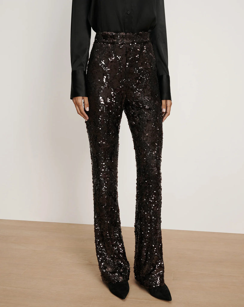 Wow!&nbsp; Make a statement with the Collier Sequin trouser from Veronica Beard!&nbsp; Embellished with all over maroon sequins these cool trousers feature a slim fit, flared leg, back zipper closure and a flattering high rise waist.&nbsp; For a soft look pair with the matching Thelma cashmere cardi from the Veronicas.&nbsp; A perfect party piece!