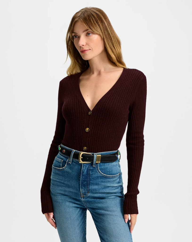 Who would have thought a cardigan could be sexy!&nbsp; Say hello to Thelma.&nbsp; Crafted from super soft 100% cashmere and featuring a flattering deep v neck, tortoise buttons and all over ribbing this is perfect on it's own or layered over a lace cami.&nbsp; In the much loved colour of the season, burgundy, this pairs beautifully with the Medina skirt from Veronica Beard. .