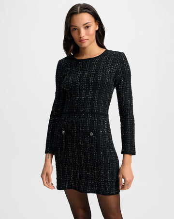 n our opinion you can never have enough knit dresses and the Channing dress definitely is worthy of a spot in your wardrobe.&nbsp; Crafted from a black tweed like knit with the perfect amount of stretch and discreetly embellished with sequins for a subtle shine this is a versatile go to.&nbsp; An excellent blend of refined and elegant this goes from day to night with ease with a simple change of shoe.