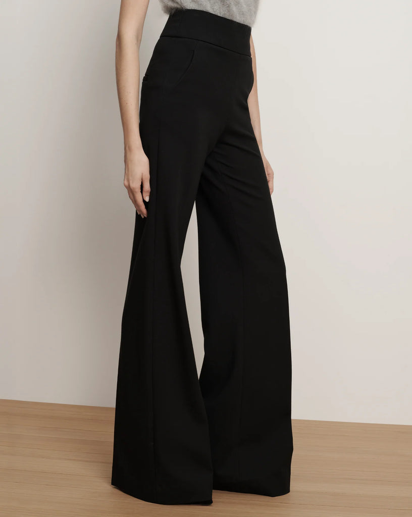 Say hello to Kalinda.&nbsp; Do you have black trousers?&nbsp; Of course you do but Kalinda definitely is worthy of a spot in your collection.&nbsp; These will quickly become your go to black trouser taking you from coffee to cocktails with style.&nbsp; Crafted from a smooth super stretchy (this trouser likes a curve) viscose knit Kalinda features a high rise flattering 3 inch waistband, a pressed front crease for polish and structure and an invisible back zipper closure for a clean finish.&nbsp; The ease of