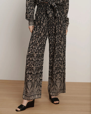Channel your inner boho woman with these gorgeous trousers from Veronica Beard.&nbsp; Crafted from a super lightweight cotton blend and featuring a relaxed fit, a high smocked waistband and a wide leg silhouette these are effortless yet chic.&nbsp; Paired with the matching Lloyd Shirt for the ultimate co-ord this is a great outfit to take on your next holiday!&nbsp;