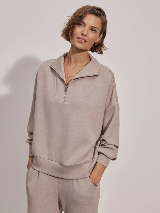 Varley have done it again with this super soft relaxed half zip.  Made in their signature DoubleSoft™️ fabric, in a neutral "goes with everything" taupe colour, you wont want to take it off!