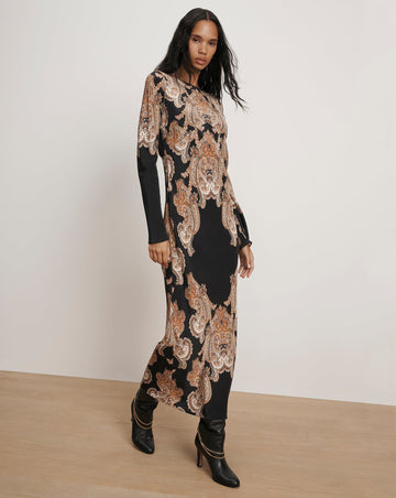 This is an RSVP worthy dress!&nbsp; Crafted from a super luxury silk blend georgette in a bold graphic paisley motif Lupita features a body skimming silhouette with bias cut construction and drapes just beautifully!&nbsp; The imagery does not do this dress justice.&nbsp; Pair with a heel for your next event and get ready for the compliments!