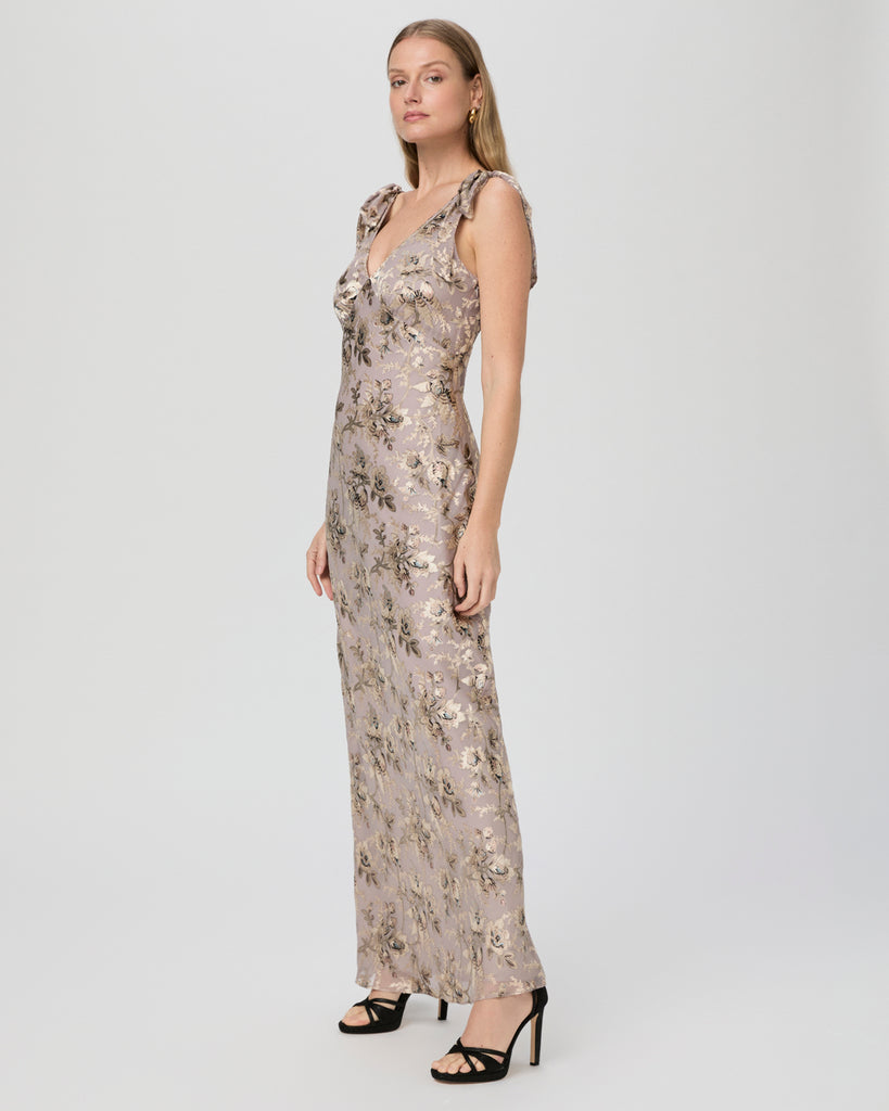 If you're looking for a WOW dress Vialla from Paige is just what you're after! Crafted from grey satin with a floral velvet burnout design this maxi length dress features tie details at the shoulders, a long slit at the back, angled bust seams and is cut on the bias so gives a fantastically flattering fit! 