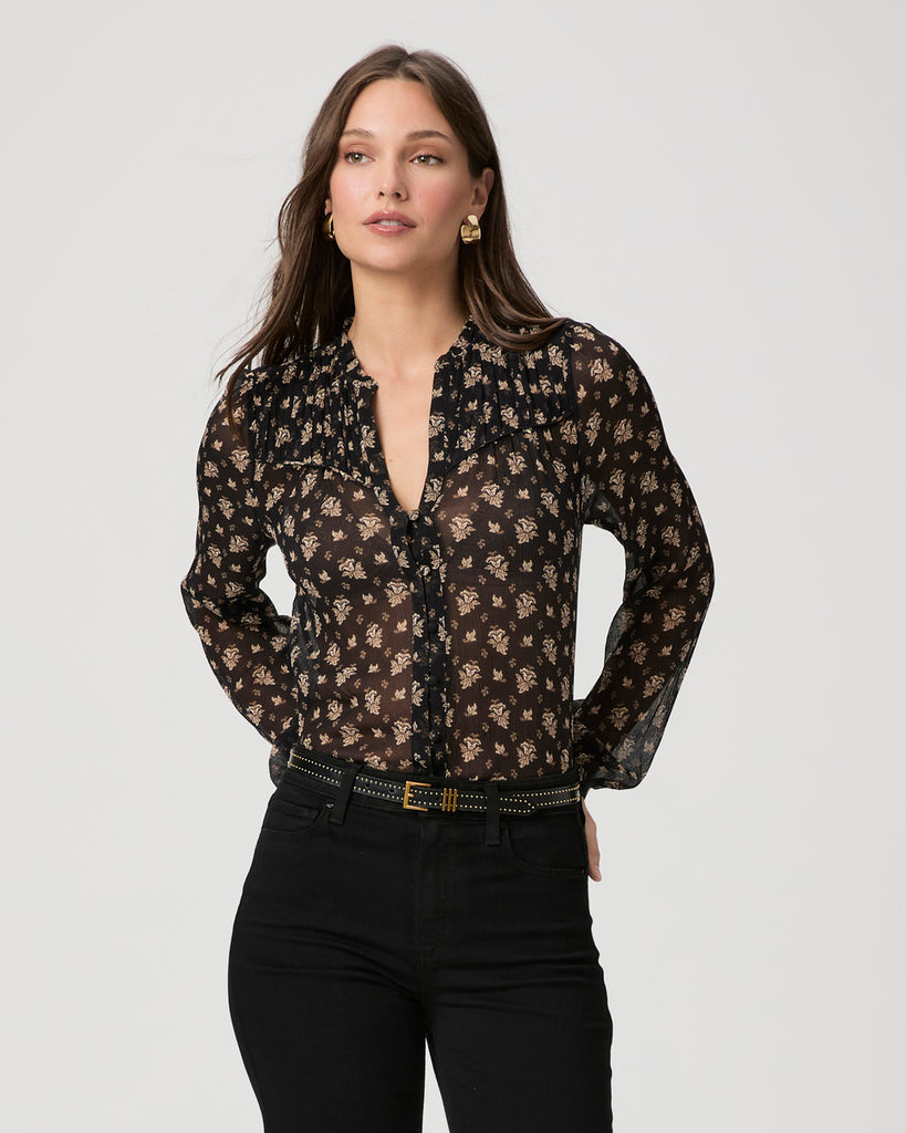 We love a Paige blouse and this one does not disappoint!&nbsp; &nbsp;Crafted from 100% silk georgette and featuring pleat detailing at the shoulder, fabric covered centre buttoning and elasticated cuffs this is perfect paired with black denim for a sophisticated evening look.&nbsp;