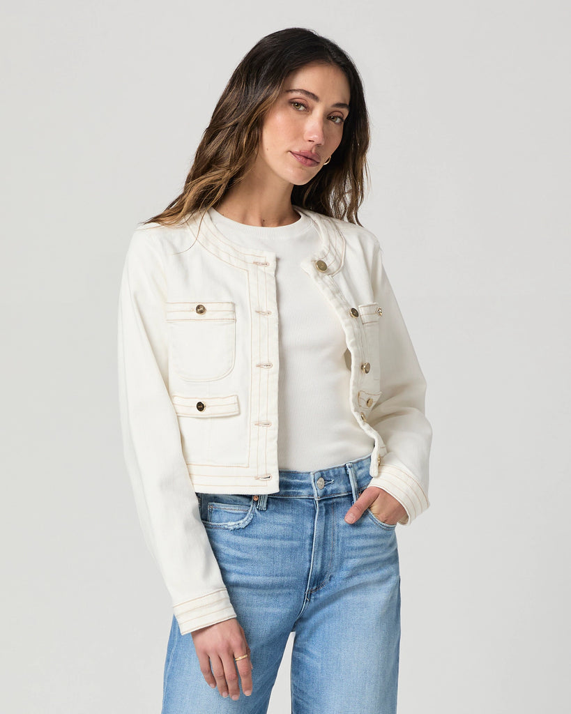 Kiya is a new style jacket from Paige - a classic collarless denim jacket!&nbsp; Featuring a cropped neat fit, stitch detailing, a 5 button closure and double patch pockets and coming in a vintage inspired ecru this is a jacket you will reach for again and again.&nbsp;