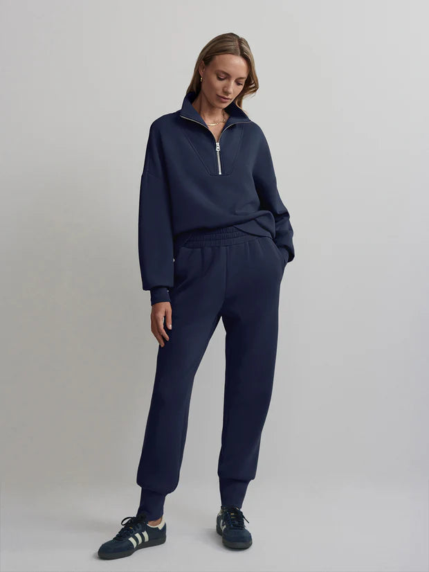 These elegant, slim, tailored fit pants will become your off duty staple. With a draw cord, cuffed bottoms, pockets on the side and back and an inside leg length of 25". Pair with the matching Hawley Half Zip for a sophisticated co-ord, perfect to travel in or running day to day errands.