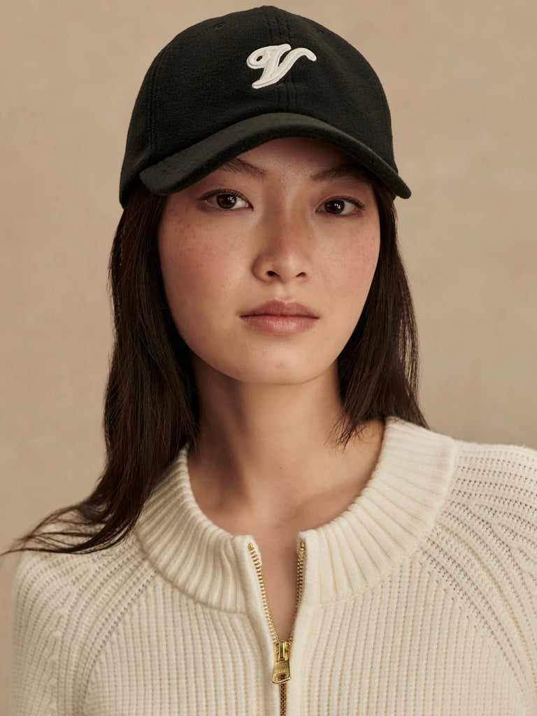 Complete your Varley look with their classic soft fleece Raina cap, featuring a signature V embroidered patch and an adjustable back strap for the perfect fit.