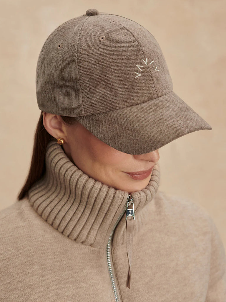 Uber cool, soft, lightweight and breathable classic baseball cap. Outer comes in a soft chenille fabric and a sweat wicking internal band means it's practical as well as pretty.Metal adjustable tab at the back and subtle Varley branding keep this piece understated.