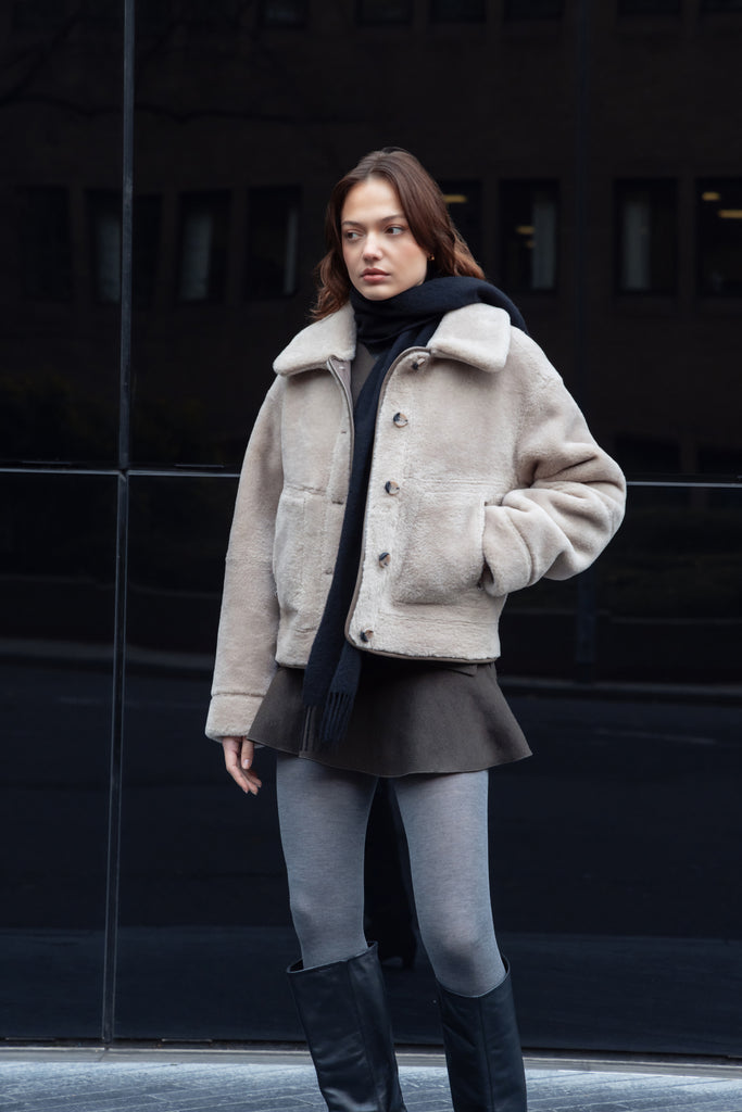 We love a coat that is 2 in 1!&nbsp; This is an excellent example of function meets style!&nbsp; Featuring faux leather on one side and faux fur on the other and a smart collar this is the perfect weekend jacket.&nbsp; In a goes with everything neutral this will quickly become your go to jacket with your favourite denim.&nbsp;