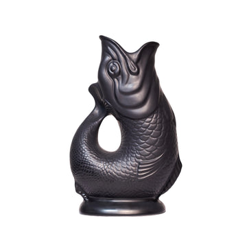 These stunning handmade "Gluggle Jugs" make the perfect gift or addition to your home. They are a perfect centrepiece for your table and, as well as being used to serve water, they can also be used as a quirky vase, a utensil holder or as a decorative piece. Manufactured in England since the 1870's they are iconic because they make a delightful "gluggle" sound when poured! The only question is, which colour to buy?!