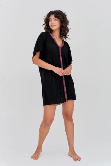 The Mini Abaya Dress from Pitusa is made from their sheer burnout fabric. It features a v-neckline, short sleeves and their signature Inca trim. It is the perfect holiday cover-up and will take you from the beach to the bar with confidence!