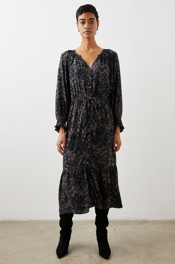 Cut from flowy rayon crepe, The Cece dress from Rails features billowy sleeves with elasticated cuffs, a v-neckline and a full button down front. With an elasticated adjustable waistband, this midi dress is not only super comfortable but flattering!