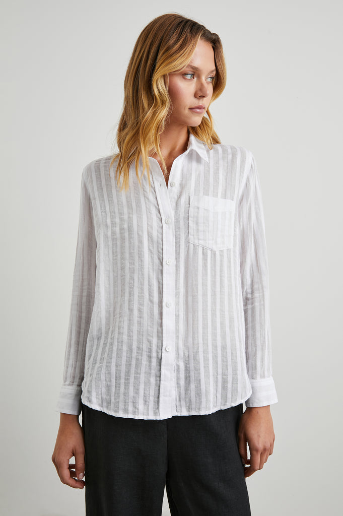 Charli is back with a pretty tone on tone stripe.&nbsp; A favourite from Rails, the Charli is crafted from a super soft linen and rayon blend. It has a longer hem at the back, a single chest pocket and a relaxed body shape that flatters just about everyone. Pair with your denim for a lazy Sunday afternoon.
