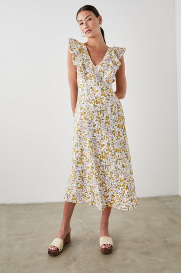 Let me introduce you to Constance.  This perfect for all occasions dress flows beautifully to the waist, features criss cross ties in the back and comes in a feminine floral print.  Crafted from 100% super soft linen pair this with slinky sandals for a night out or throw on some trainers and you're set for a day look!