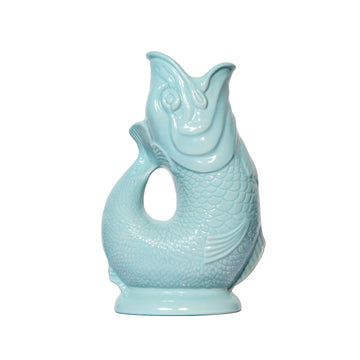 These stunning handmade "Gluggle Jugs" make the perfect gift or addition to your home. They are a perfect centrepiece for your table and, as well as being used to serve water, they can also be used as a quirky vase, a utensil holder or as a decorative piece.  Manufactured in England since the 1870's they are iconic because they make a delightful "gluggle" sound when poured! The only question is, which colour to buy?!