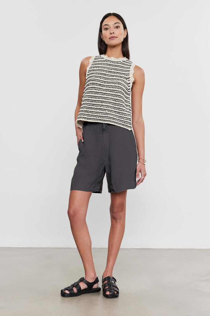 The Francis shorts in shadow from Velvet by Graham &amp; Spencer will definitely elevate your Summer wardrobe!&nbsp; Crafted from super soft woven linen these shorts feature a button zipper closure, partial elastic waistband for comfort and pockets at the front and back.&nbsp; Stylish and functional pair with the Sophie Knit for an effortlessly cool Summer outfit!