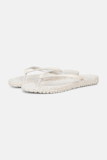 Slip on these super comfy flip flops by Ilse Jacobsen which will take you from beach days to nights out. The cream and glitter finish adds a touch of glamour and the textured sole not only gently massages your feet but is made from Air Rubber keeping the shoe lightweight and flexible.